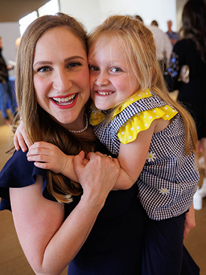 Match Day Cobb holding her daughter Elizabeth